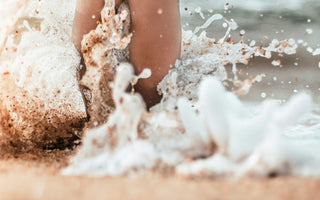 woman standing in the ocean how long does waxing last
