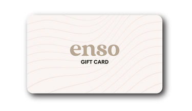 Digital graphic of an enso gift card with a light beige background featuring subtle wavy lines a prominent dark beige enso logo and black GIFT CARD text enclosed within a sleek rounded black border